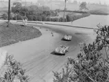 Richie Ginther behind the wheel of chassis no. 550-0089, race #211, at the 1956 Pomono Road Races.