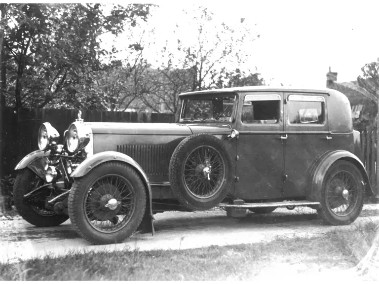 The Lagonda is pictured in period (date unknown).