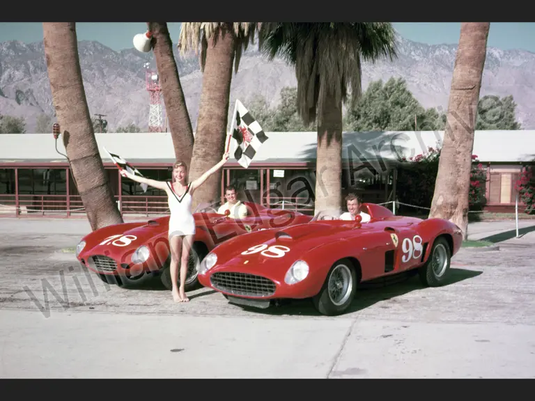 Newly crowned Miss Palm Springs, Stephanie Bruton, alongside John Edgar’s Ferraris, with Jack McAfee in the 375 Plus and Carroll Shelby in the 410 Sport at Palm Springs, November 1956. 