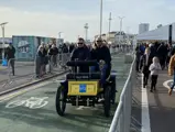The De Dion-Bouton is pictured participating in the London to Brighton Veteran Car Run.