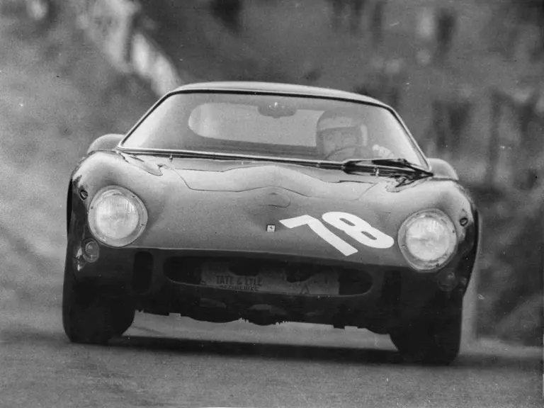 Chassis number 3413 GT at speed at Brands Hatch with David Piper in December 1965.