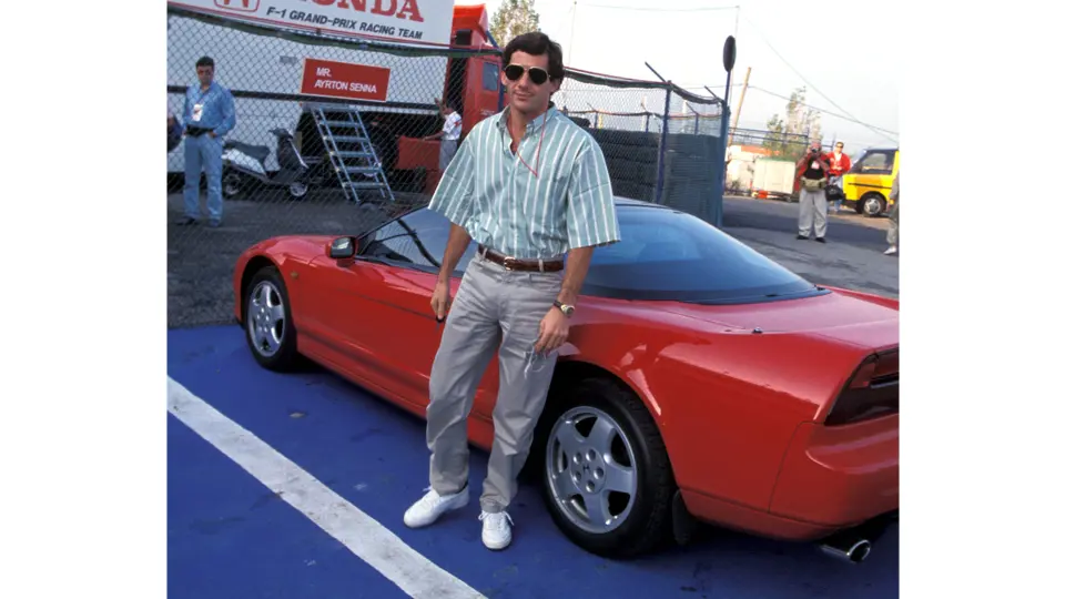 Ayrton Senna arrives at Circuito Estoril for the 1991 Portuguese Grand Prix in his Honda NSX.