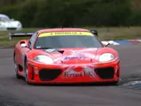 011 M as seen during the ninth round of the 2003 British GT Championship at Thruxton, where it placed second overall and second in class.