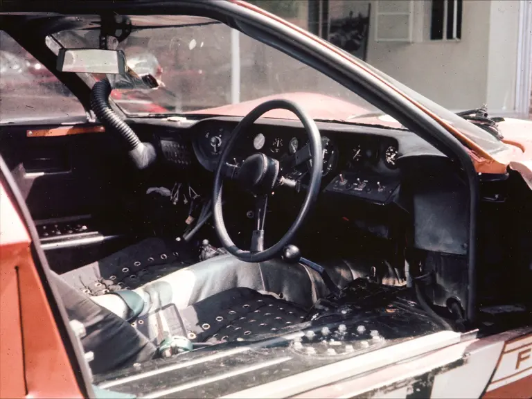 P/1032 at Luigi Chinetti’s Ferrari dealership in Greenwich, Connecticut, following the 1966 24 Hours of Le Mans. Photo taken in the summer of 1966, prior to P/1032’s return to Europe for display at auto shows. Note the removable padded steering wheel cover, a Holman-Moody touch.