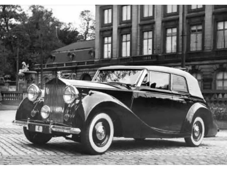 The Rolls-Royce is captured in period.