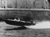 Roger Brunet at the helm of Sois Sage II en route to winning the 1957 Aux 6 Heures de Paris.