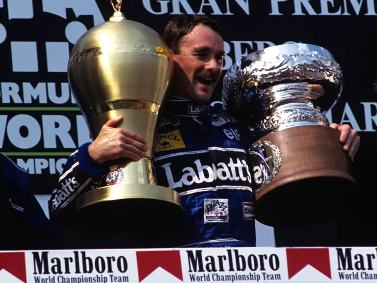 San Marino Grand Prix, Imola, Italy. 1992
Podium Nigel Mansell Williams FW14B wins the race Riccardo Patrese Williams FW14B  is 2nd and Ayrton Senna Mclaren-Honda MP4/7A  3rd
© Formula One Pictures / Picture by John Townsend. Office tele (+36)26 322 826 mobile (+36) 70 776 9682. UK Mobile +44 7747 862606 www.f1pictures.com.
Vat Number 221 9053 92
 
 
