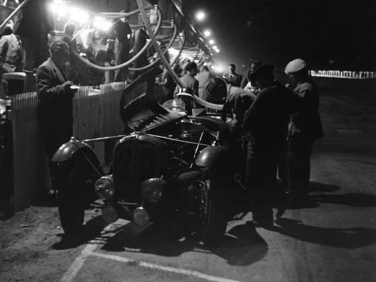 The Delahaye making a late night pit stop at the 1939 24 Hours of Le Mans.