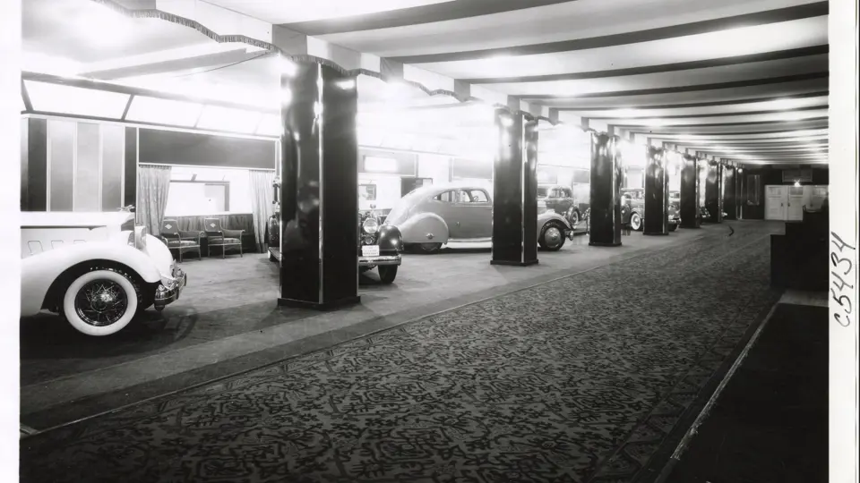 LeBaron Sport Coupe 1106-4, pictured at middle in its original trim at the 1934 New York Auto Show.