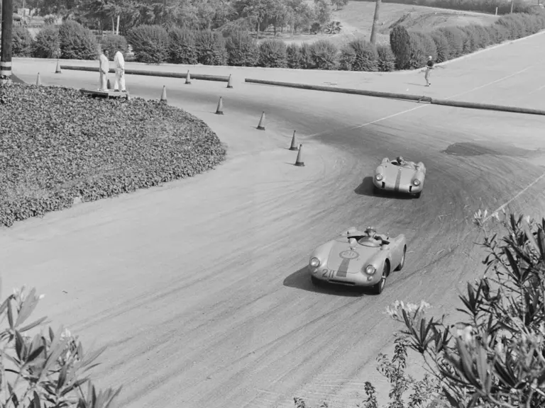 Richie Ginther behind the wheel of chassis no. 550-0089, race #211, at the 1956 Pomona Road Races.