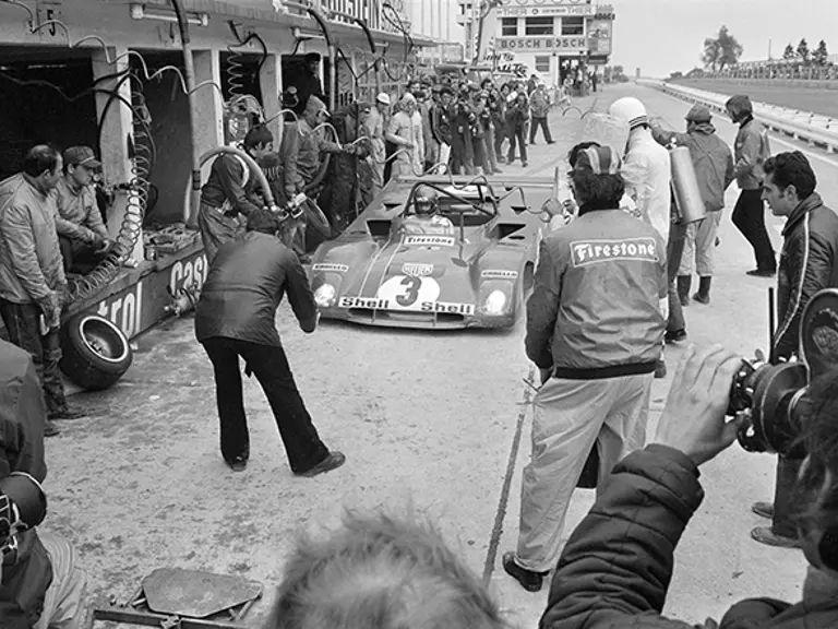 Ronnie Peterson pulls into the Nürburgring pitlane for fuel and a set of new tyres. The Swede would go on to claim victory later that day.
