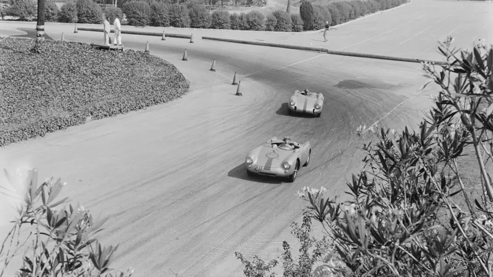 Richie Ginther behind the wheel of chassis no. 550-0089, race #211, at the 1956 Pomona Road Races.