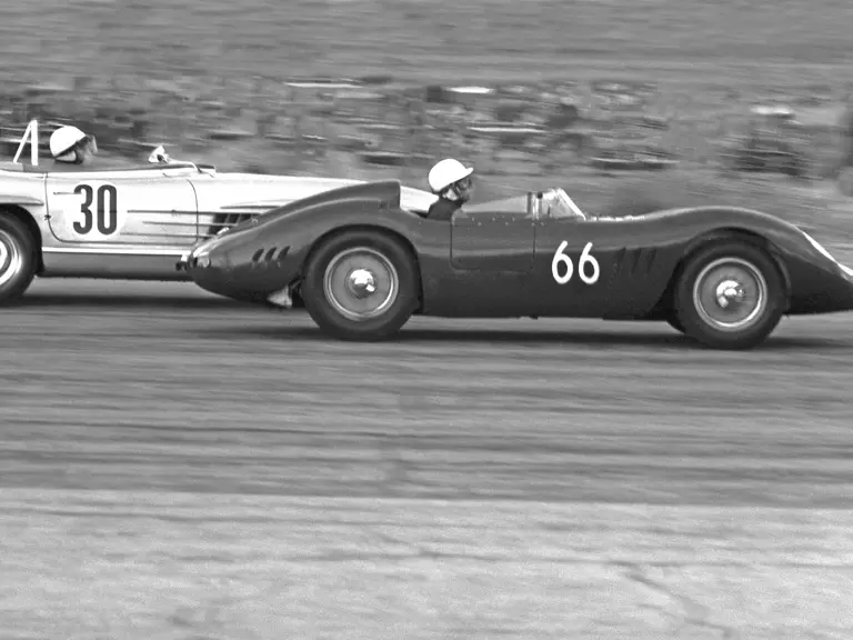 Chassis no. 2425 (#66), driven by Jim Hall, passes a Mercedes-Benz 300 SL Roadster (#30), driven by Paul O'Shea, at the SCCA national event at Palm Springs, 3 November 1957.