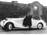 The legendary Belgian racer Olivier Gendebien proudly poses with the Bentley, which he owned and cherished for many decades.