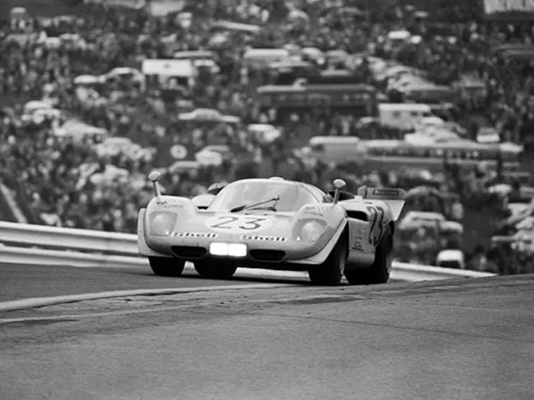 The Ferrari 512 S is seen rising up out of Eau Rouge during the 1970 1000 km of Spa, where it was driven by Derek Bell and Hughes de Fierlant.
