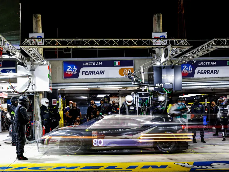 Chassis 3858 refuels as night falls during the 2021 24 Hours of Le Mans.