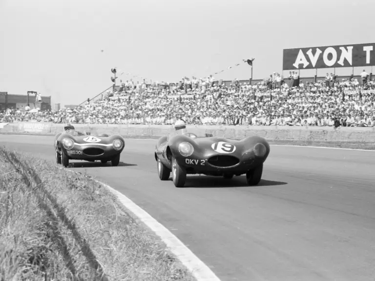 Bob Berry behind the wheel of OKV2 at the 1957 British Grand Prix at Aintree.