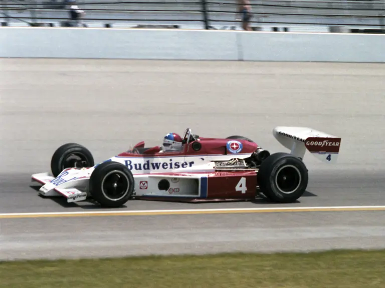 Johnny Rutherford competes at the 1979 Indianapolis 500 in his #4 McLaren M24B.