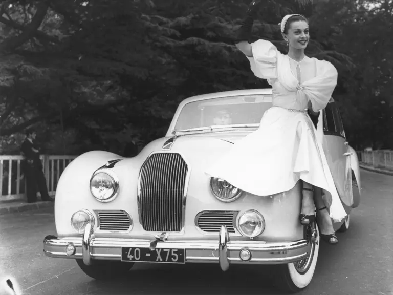 French fashion model and actress Capucine posing on 100238 in the Bois de Boulogne, 26 June 1951.