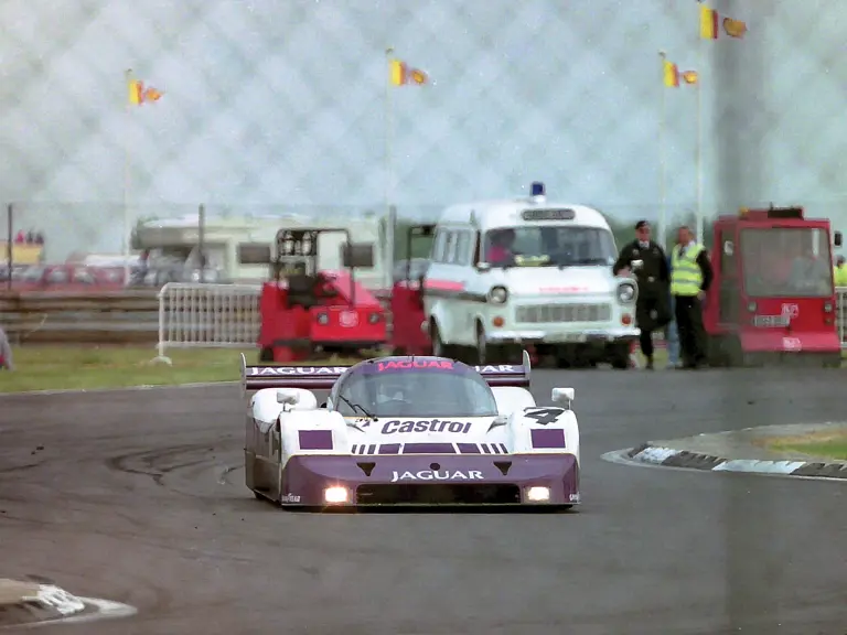 The No.4 Jaguar, driven by Jan Lammers and Andy Wallace, places 2nd at the 1990 Silverstone World Sports Prototype Championship.