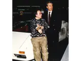 Giorgio Moroder and Claudio Zampolli leaning on the Cizeta-Moroder V16T at the 1989 Genva Auto Salon.