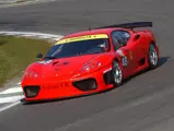 011 M at speed during the first round of the 2002 British GT Championship at Brands Hatch, where it finished fourth overall and third in class.