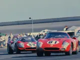 Chassis no. 5893, #81 driven by Masten Gregory and David Piper, lead Ferrari Dino 206 S driven by Pedro Rodriguez and Charlie Kolb at the 1968 24 Hours of Daytona.