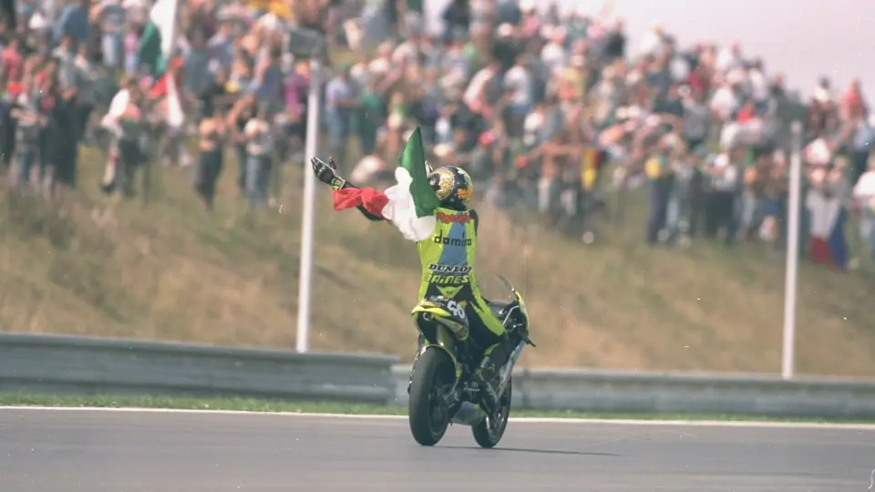 Valentino Rossi on his first career celebration lap having won the 1996 Czech Grand Prix with chassis 1291195.