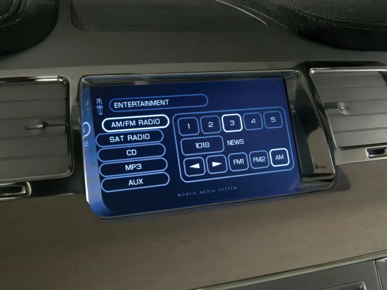 Lincoln MKS teaser: The Lincoln Mobile Media System is a next-generation touch-screen interface, incorporating audio, climate and navigation controls.