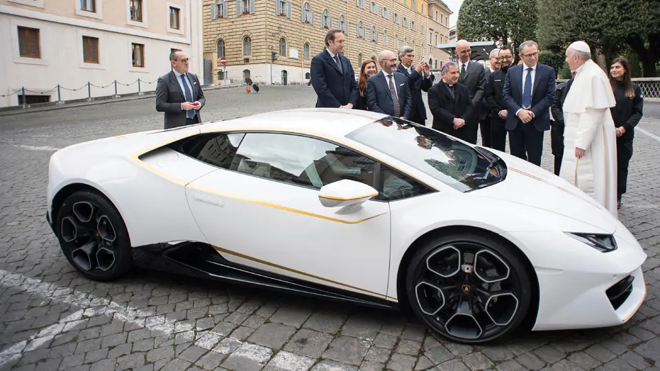 His Holiness Pope Francis signs the Lamborghini Huracán at a ceremony in Vatican City in November of 2017.