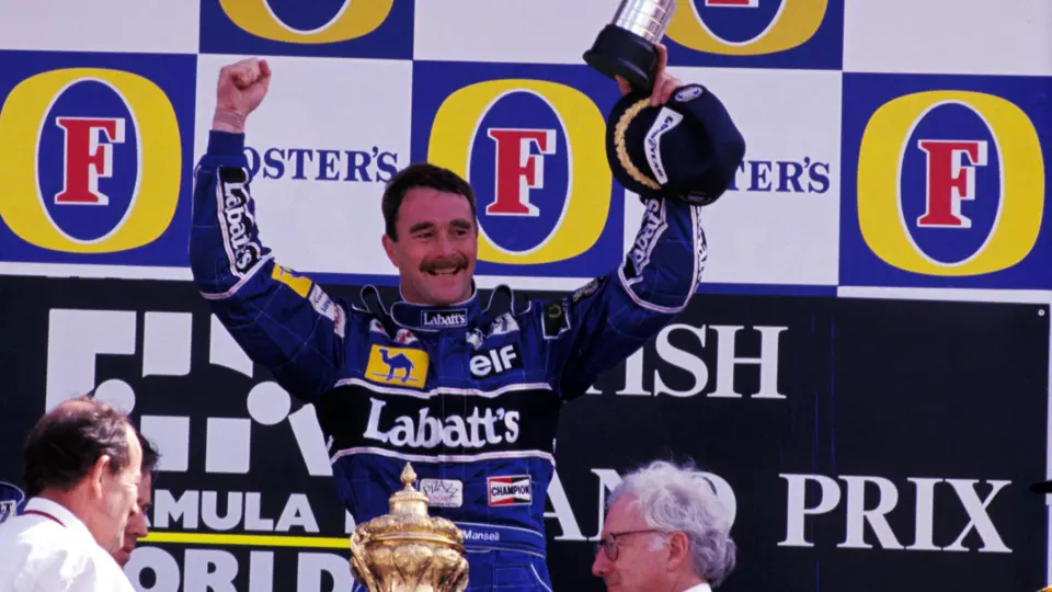 Race winner Nigel Mansell (GBR) Williams celebrates on the podium.
Formula One World Championship, Rd9, British Grand Prix, Silverstone, 12 July 1992.