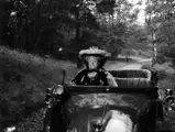 The Sunbeam appeared in the 1959 film The Mouse That Roared, where it wore the prop registration “G XII”. Peter Sellers is pictured behind the wheel as Duchess Gloriana XII.