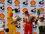 René Snel (right) celebrates on the podium having finished in 3rd place at the Super Car Cup event at Zandvoort in May 1998.