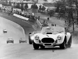 The team of Bob Bondurant and David Piper lead the way at Brands Hatch, 1966.