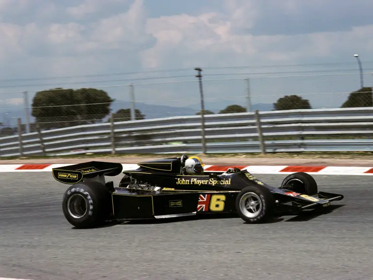 Mario Andretti in his Lotus 77 races at the 1976 Spanish Grand Prix. This image is for reference purposes only.