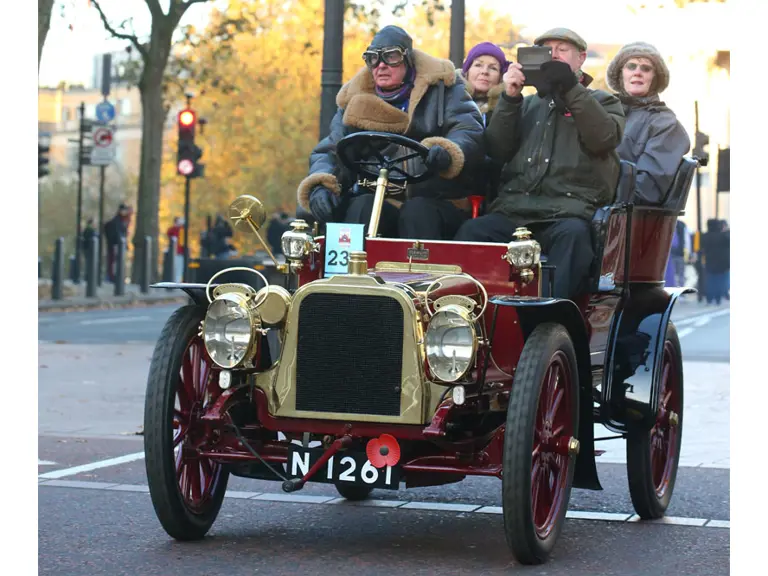 The Clément is fully loaded with passengers as it is pictured on the 2016 London to Brighton Veteran Car Run.