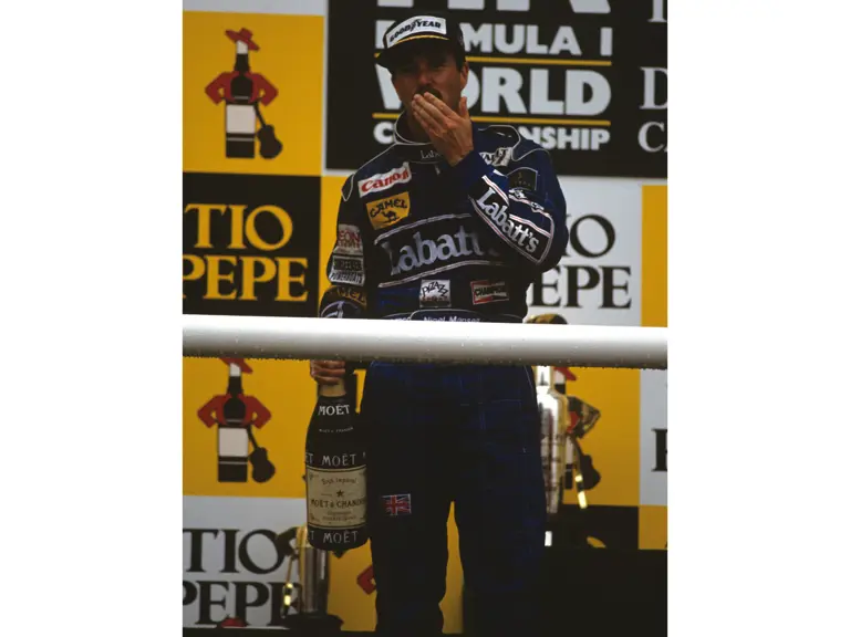 Spanish Grand Prix, Circuit de Catalunya, Barcelona, Spain 1992
Podium Nigel Mansell Williams FW14B wins the race, Michael Schumacher Benetton-Ford B192  is 2nd and Jean Alesi Ferrari F92A  3rd
© Formula One Pictures / Picture by John Townsend. Office tele (+36)26 322 826 mobile (+36) 70 776 9682. UK Mobile +44 7747 862606 www.f1pictures.com.
Vat Number 221 9053 92
 
 
