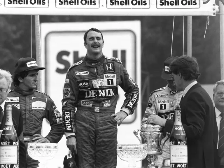 British GP Brands Hatch, Kent, England 1986   
Podium Nigel Mansell Williams FW11 wins the race, Nelson Piquet Williams FW11 is 2nd and Alan Prost Mclaren MP4/2c  3rd
© Formula One Pictures / Picture by John Townsend. Office tele (+36)26 322 826 Hungarian mobile (+36) 70 776 9682. UK Mobile +44 7747 862606 www.f1pictures.com.
Vat Number 221 9053 92
 
