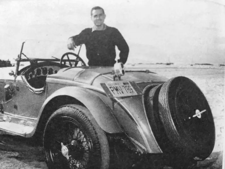 Three time Le Mans winner and Formula 1 World Champion Phil Hill poses with chassis 10814362 which he owned for 30 years.