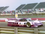 The No.4 Jaguar, driven by Jan Lammers and Andy Wallace, places 2nd at the 1990 Silverstone World Sports Prototype Championship.