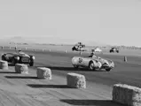 John Biehl in the Veritas RS leads Ernie McAfee’s Siata 208S at the 1953 SCCA National March.