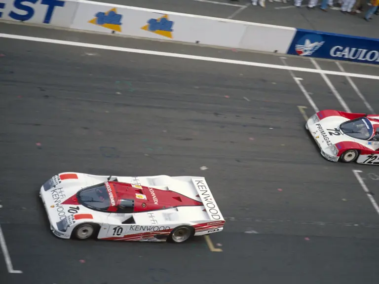 Chassis CK6-88 leads the rival Porsche 962 C from Primagaz Compétition during the 1988 24 Hours of Le Mans.