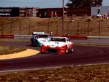 The Winters/Bergstrom Porsche 924 GTR leads the Porsche 935 of John Fitzpatrick Racing in the 1983 3 Hours of Portland.