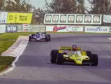 Fittipaldi pulls away from the Tyrrell 009 of Didier Pironi in Canada.