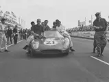 Chassis 5893 and Luigi Chinetti’s N.A.R.T. team celebrating their first overall finish at the 1965 24 Hours of Le Mans.