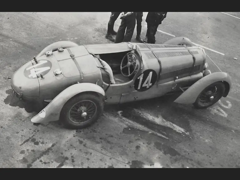 Seen from above the pit lane at the 1938 24 Hours of Le Mans, the Delahaye would be driven to a 2nd-place finish.