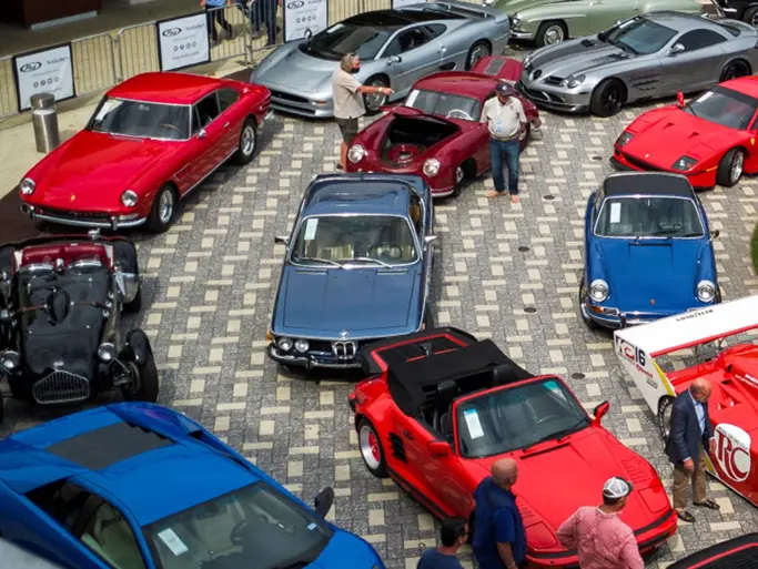 Spectators viewing lots on display at RM Sothebys Live Monterey Auction Preview 2021