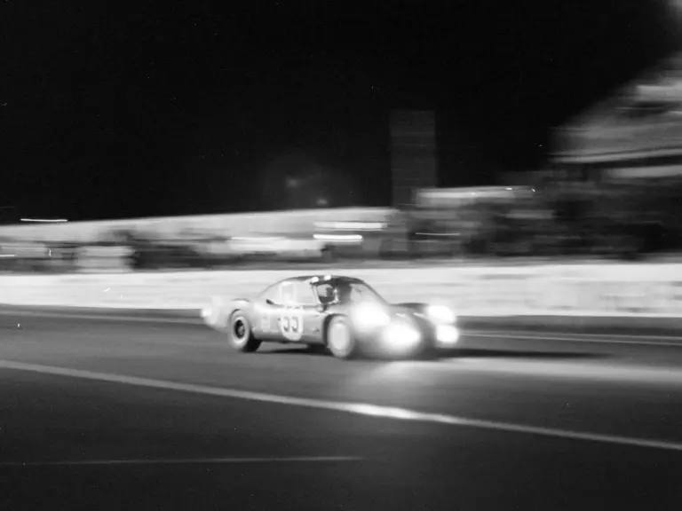 As night fell at the 1968 24 Hours of Le Mans, the Alpine A210 continued to push on at a pace.