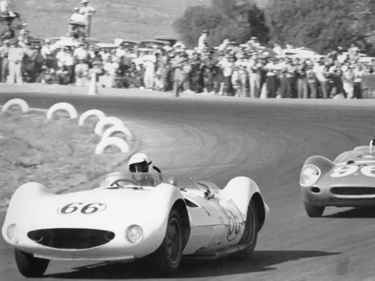 Jim Hall leading Dan Gurney’s Lotus 19 at the LA Times GP at Riverside, October, 1961.