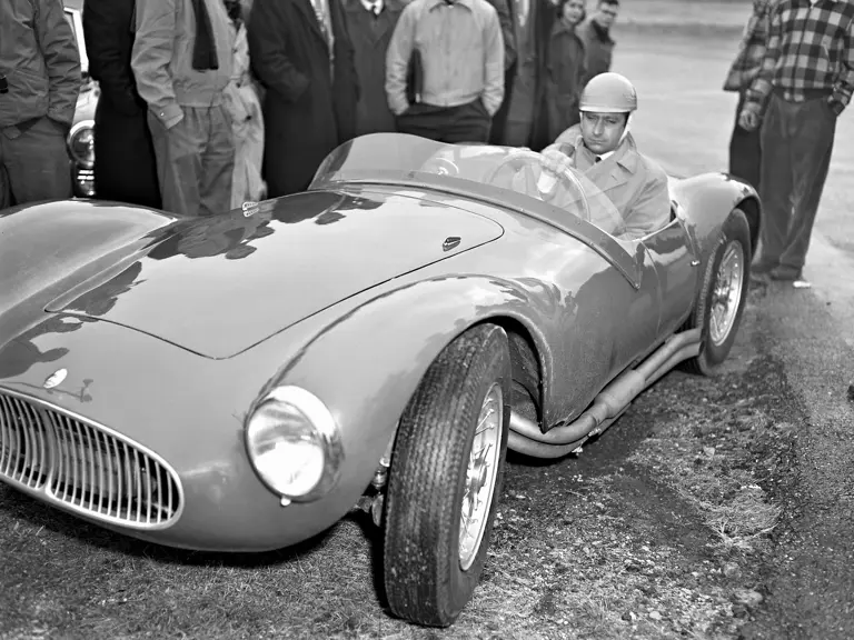 Juan Manuel Fangio sampling a 2-liter Maserati in USA circa 1954.